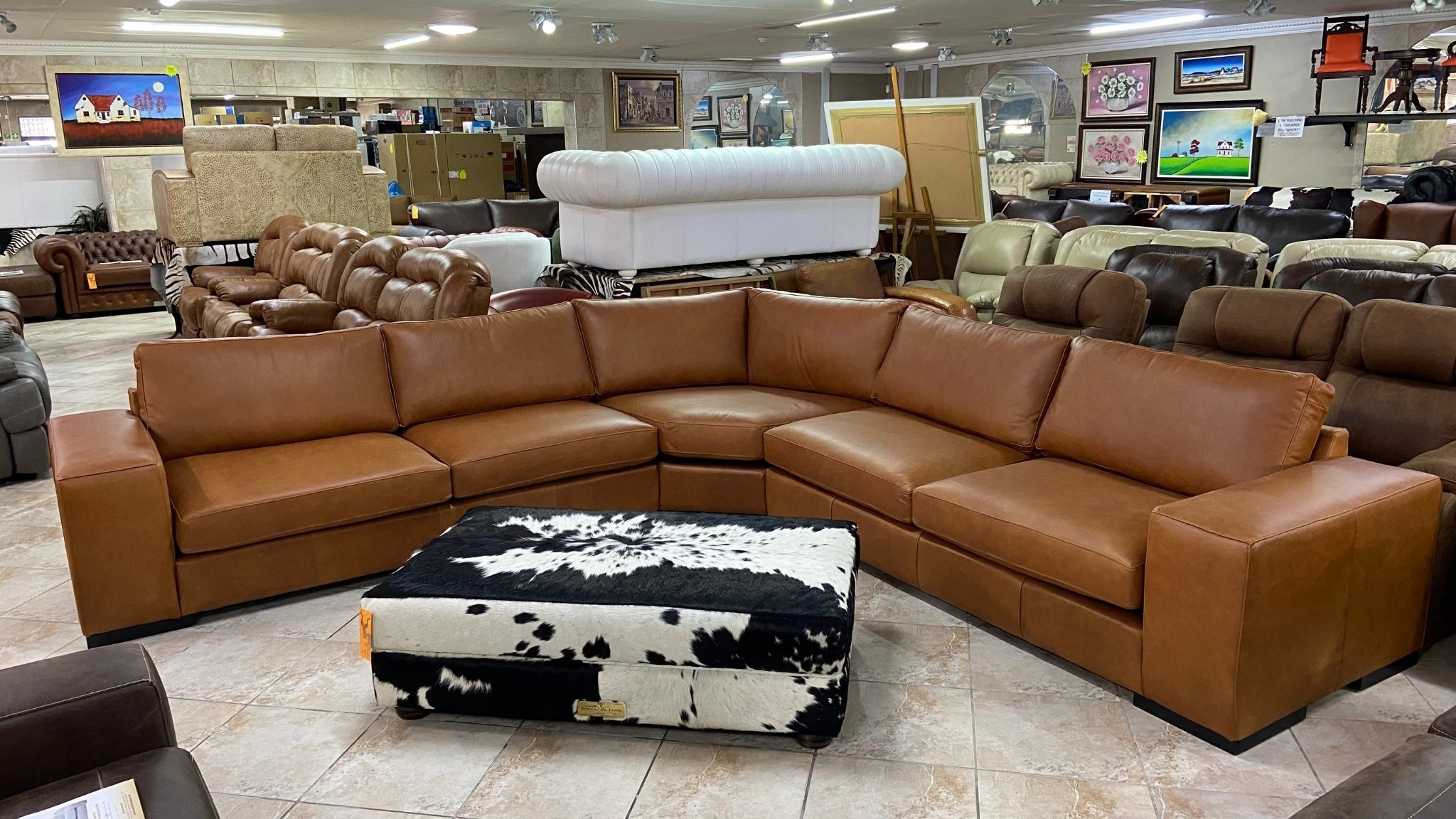 Gemsbok Curve Leather Corner Sofa Side View